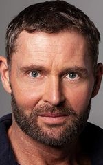 Адриан Буше